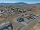 Aerial view of a single-story house and surrounding neighborhood at 1761 Moose St, Pahrump, NV 89048