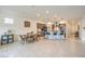 Open-concept living space with a well-appointed kitchen, dining area, and access to the backyard at 617 Sylvan St, Henderson, NV 89002