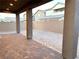 Covered patio and spacious backyard with block wall at 5076 Dule Grove St, Las Vegas, NV 89130