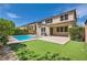 Private backyard featuring a swimming pool, putting green, and patio at 3605 Sapphire Sea Ct, North Las Vegas, NV 89031