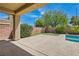 Backyard featuring an outdoor kitchen and putting green area at 3605 Sapphire Sea Ct, North Las Vegas, NV 89031