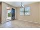 Bright dining area with sliding glass doors leading to outdoor space at 3605 Sapphire Sea Ct, North Las Vegas, NV 89031