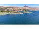 Stunning aerial view of a lake, golf course, and luxury waterfront properties at 44 Alta Cascata Pl, Henderson, NV 89011