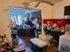 View from kitchen to dining room filled with clutter at 1552 Dorothy Ave, Las Vegas, NV 89119