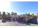 External view of single-story house with a concrete block wall for added privacy at 1552 Dorothy Ave, Las Vegas, NV 89119