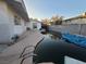 Backyard swimming pool needs cleaning and maintenance; potential for outdoor recreation and relaxation after servicing at 1552 Dorothy Ave, Las Vegas, NV 89119