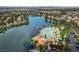 Aerial view of community lake, pool, and surrounding homes at 2628 Starfish Ct, Las Vegas, NV 89128