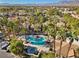 Community pool and homes with mountain views at 2628 Starfish Ct, Las Vegas, NV 89128