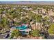 Aerial view of community with pool and mountain views at 2628 Starfish Ct, Las Vegas, NV 89128