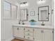 Elegant bathroom with double vanity and updated fixtures at 2628 Starfish Ct, Las Vegas, NV 89128