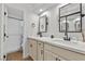 Updated bathroom with double vanity and modern fixtures at 2628 Starfish Ct, Las Vegas, NV 89128
