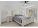 Spacious bedroom with ceiling fan and private access to backyard at 2628 Starfish Ct, Las Vegas, NV 89128
