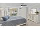 Bedroom with backyard access and built-in dresser at 2628 Starfish Ct, Las Vegas, NV 89128