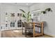Cozy breakfast nook with a wooden table and chairs near sliding doors at 2628 Starfish Ct, Las Vegas, NV 89128
