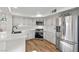 Modern kitchen featuring stainless steel appliances and quartz countertops at 2628 Starfish Ct, Las Vegas, NV 89128