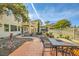 Relaxing backyard oasis with patio, seating area, and mature landscaping at 373 Via Sonador, Henderson, NV 89012
