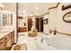Large bathroom with double vanity, soaking tub, and separate shower at 373 Via Sonador, Henderson, NV 89012