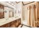 Elegant bathroom with double sinks and a shower/tub combo at 373 Via Sonador, Henderson, NV 89012