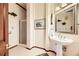 Elegant bathroom with pedestal sink, shower, and decorative accents at 373 Via Sonador, Henderson, NV 89012