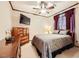 Comfortable bedroom with a large bed and plenty of natural light at 373 Via Sonador, Henderson, NV 89012