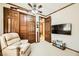 Versatile bonus room with a large TV and comfortable recliner at 373 Via Sonador, Henderson, NV 89012