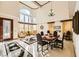 Bright dining room featuring a large table, high ceilings, and lots of natural light at 373 Via Sonador, Henderson, NV 89012