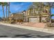 Two-story house with brick driveway and landscaping at 373 Via Sonador, Henderson, NV 89012