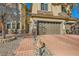 Two-story house with brick driveway and landscaping at 373 Via Sonador, Henderson, NV 89012