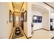 Inviting hallway with a large TV and plenty of wall space at 373 Via Sonador, Henderson, NV 89012
