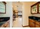 Butler's pantry with granite countertops and wood cabinetry at 373 Via Sonador, Henderson, NV 89012