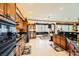 Gourmet kitchen boasts ample cabinetry, stainless steel appliances, and granite countertops at 373 Via Sonador, Henderson, NV 89012