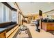 Open kitchen with breakfast nook, stainless steel appliances, and view to living room at 373 Via Sonador, Henderson, NV 89012