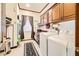 Convenient laundry room with washer, dryer, and storage at 373 Via Sonador, Henderson, NV 89012
