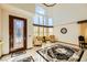 Bright living room with high ceilings and large windows at 373 Via Sonador, Henderson, NV 89012