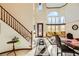 Bright living room with high ceilings and large windows at 373 Via Sonador, Henderson, NV 89012