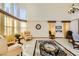 Bright living room with high ceilings and large windows at 373 Via Sonador, Henderson, NV 89012