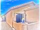 Exterior shot featuring small patio area with desert plants, stucco, and desert landscaping at 4036 Shetland Pony St, Las Vegas, NV 89122