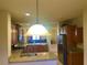 Open kitchen featuring granite countertops, stainless steel appliances, and wood cabinets at 4036 Shetland Pony St, Las Vegas, NV 89122