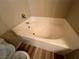 Bathroom with a large bathtub and tile surround at 10550 W Alexander Rd # 2149, Las Vegas, NV 89129