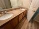 Double sink bathroom vanity with granite countertop at 10550 W Alexander Rd # 2149, Las Vegas, NV 89129