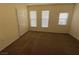 Bright bedroom with ample natural light and neutral carpeting at 10550 W Alexander Rd # 2149, Las Vegas, NV 89129