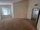 Spacious bedroom with large window and neutral carpeting at 10550 W Alexander Rd # 2149, Las Vegas, NV 89129