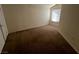 Bright bedroom with window and neutral carpet at 10550 W Alexander Rd # 2149, Las Vegas, NV 89129