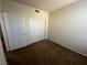 Bright bedroom with double door closet and neutral decor at 10550 W Alexander Rd # 2149, Las Vegas, NV 89129