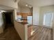 Kitchen featuring a breakfast bar and light wood cabinets at 10550 W Alexander Rd # 2149, Las Vegas, NV 89129