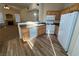 Kitchen features granite countertops and wood cabinets at 10550 W Alexander Rd # 2149, Las Vegas, NV 89129