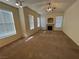 Living room with fireplace and ample natural light at 10550 W Alexander Rd # 2149, Las Vegas, NV 89129