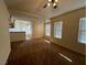 Open living area with kitchen view and breakfast bar at 10550 W Alexander Rd # 2149, Las Vegas, NV 89129