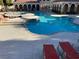 Community pool with lounge chairs and spa at 10550 W Alexander Rd # 2149, Las Vegas, NV 89129