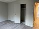 Bedroom with wood-look floors and a closet at 2529 Rialto Rd, Las Vegas, NV 89108